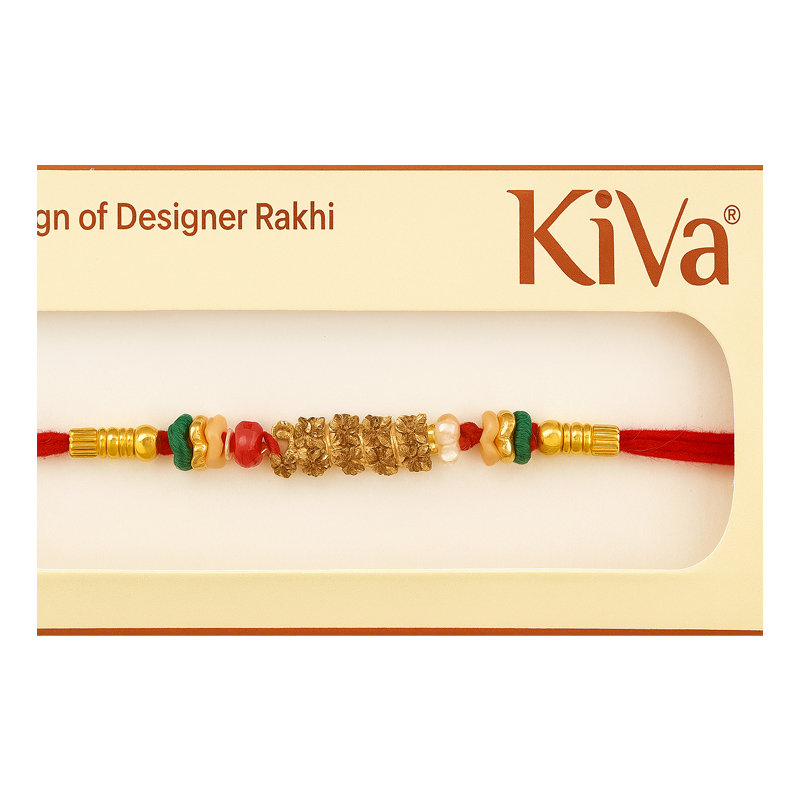 Designer Rakhi with gold and red beads in Kiva packaging