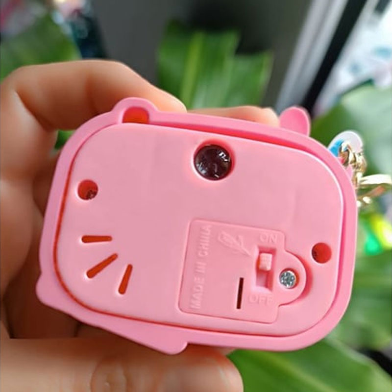 Stylish Pocket-Sized Camera Keychain with Built-in Projector
